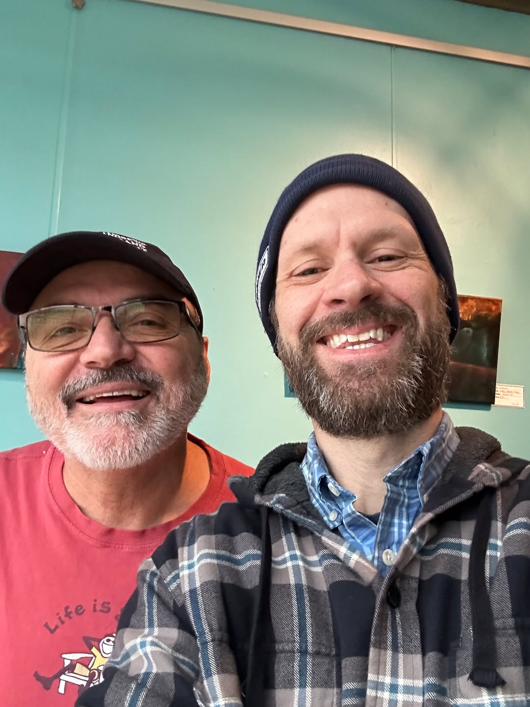Andre Lachance and Michael Bleau meeting in a coffee shop